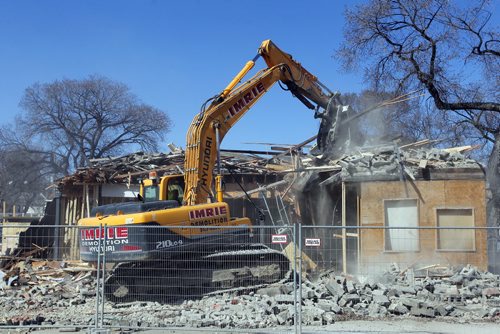 545 Sargent Avenue gets demolished this afternoon. BORIS MINKEVICH/WINNIPEG FREE PRESS APRIL 22, 2015