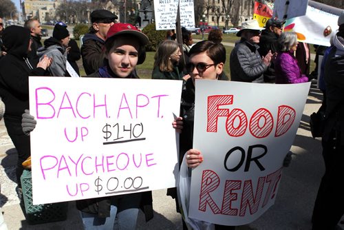 Anti-poverty advocates will gathered at the steps of the Manitoba Legislature Thursday, April 23 at 12:15 pm to ask and the Manitoba government to make poverty reduction measures a priority its 2015 provincial budget. Organizers are asking for Rent Assist to be increased to 75 percent median market rent in this years budget and for the Manitoba Housing budget to be increased by $30 million. Finance Minister Greg Dewar agreed to be present to receive the demands on behalf of the Manitoba Government. BORIS MINKEVICH/WINNIPEG FREE PRESS APRIL 23, 2015
