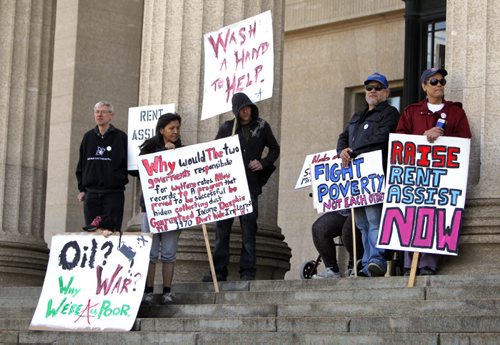 Anti-poverty advocates will gathered at the steps of the Manitoba Legislature Thursday, April 23 at 12:15 pm to ask and the Manitoba government to make poverty reduction measures a priority its 2015 provincial budget. Organizers are asking for Rent Assist to be increased to 75 percent median market rent in this years budget and for the Manitoba Housing budget to be increased by $30 million. Finance Minister Greg Dewar agreed to be present to receive the demands on behalf of the Manitoba Government. BORIS MINKEVICH/WINNIPEG FREE PRESS APRIL 23, 2015