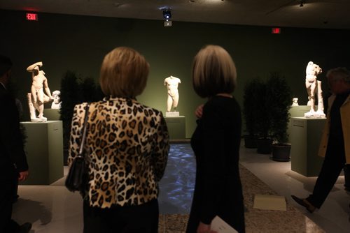 Special guests view artwork from the Olympus exhibit during a  private viewing Thursday evening just prior to the grand opening.   Ruth Bonneville / Winnipeg Free Press April 23, 2015
