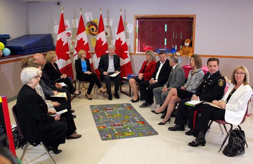 PROTECTING CANADIANS - Canadian Prime Minister Stephen Harper addresses the media at Winakwa Community Centre Friday morning. He was speaking to a community round table. His wife Laureen Harper also in photo sitting next to him. BORIS MINKEVICH/WINNIPEG FREE PRESS APRIL 24, 2015