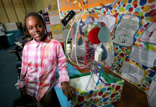 Emelyne Surville-Barland, and the alien she created called "Phitolaise the Moon Flower" at the Manitoba Schools Science Symposium, inside Max Bell Centre at the University of Manitoba, Saturday, April 25, 2015. (TREVOR HAGAN/WINNIPEG FREE PRESS)