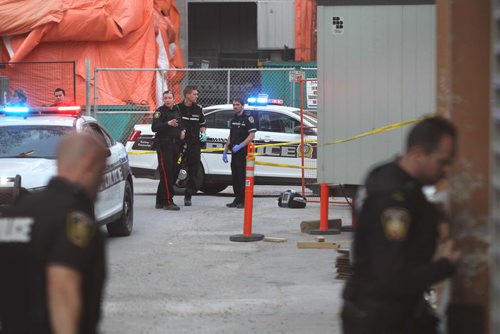 Police and ambulance respond to a call of a deceased person on Hargrave near Portage Ave. Saturday evening.  No further information at this time.  Hargrave Street at Portage Ave.  is closed to all traffic.   Standup photo.    Ruth Bonneville / Winnipeg Free Press April 25, 2015