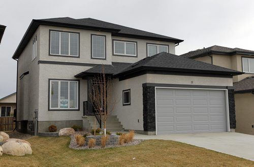 11 Wainwright Crescent in River Park South. Ventura Custom Homes.  Front Exterior. BORIS MINKEVICH/WINNIPEG FREE PRESS APRIL 27, 2015