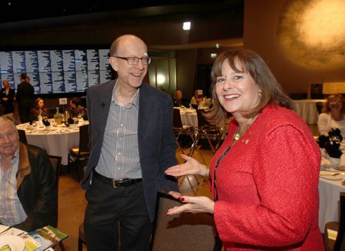 Winnipeg Chamber of Commerce luncheon featuring Gail Asper as feature speaker at the Canadian Museum for Human Rights- She chats and jokes with Pitblados LLP Norm Promislow before the event-See Gordon Sinclair Story-Apr 27, 2015   (JOE BRYKSA / WINNIPEG FREE PRESS)