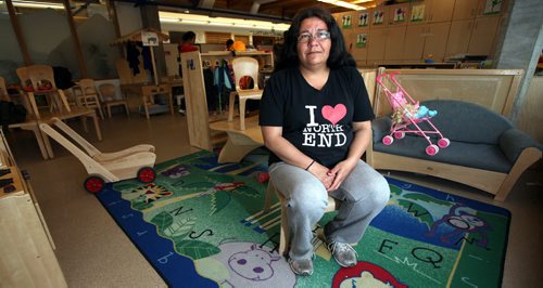 Daycare user Mary Burton whose grandkids attend,  poses at SPLASH child care centre on McGregor, to illustrate Mary Agnes Welch story on care shortages..... April 27, 2015 - (Phil Hossack / Winnipeg Free Press)
