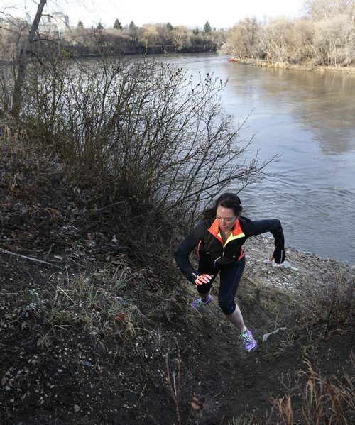 49.8 Training Basket. Mallory Richard running on a trail along the Assiniboine River. She will be  running in the ultra marathon in Spruce Woods.    Wayne Glowacki / Winnipeg Free Press April 28 2015