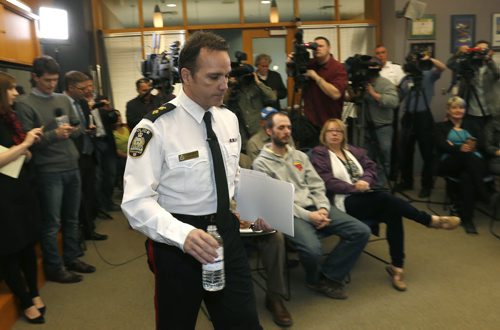 Winnipeg Police Superintendent Danny Smyth arrives at the news conference Tuesday to provide information regarding the recent homicide investigations. Bart Kives /Gord Sinclair stories  Wayne Glowacki / Winnipeg Free Press April 28 2015