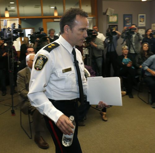 Winnipeg Police Superintendent Danny Smyth arrives at the news conference Tuesday to provide information regarding the recent homicide investigations. Bart Kives /Gord Sinclair stories  Wayne Glowacki / Winnipeg Free Press April 28 2015