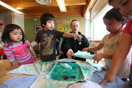 49.8 Feature photos on Early Childhood Educator Devon Schneider works with 4 -6 year-old kids at Splash Child Enrichment Centre on McGregor Street. See Mary Agnes Welch story. Ruth Bonneville / Winnipeg Free Press April 28, 2015  
Ruth Bonneville