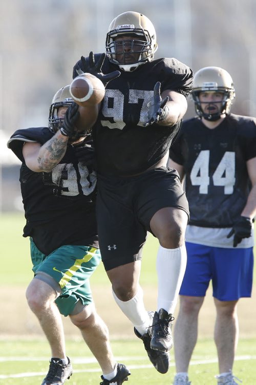 April 28, 2015 - 150427  -   David Onyemata, from Nigeria, is photographed during Bison practice at the University of Manitoba Tuesday, April 28, 2015. John Woods / Winnipeg Free Press