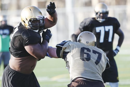 April 28, 2015 - 150427  -   David Onyemata, from Nigeria, is photographed during Bison practice at the University of Manitoba Tuesday, April 28, 2015. John Woods / Winnipeg Free Press