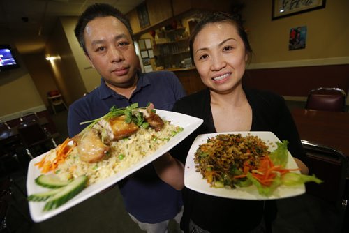April 28, 2015 - 150427  -  Restaurant owners, and husband and wife, Vu Giang (L) and Van Le, at their Vietnamese restaurant Pho Hoi An Tuesday, April 28, 2015. John Woods / Winnipeg Free Press