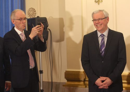 Premier Greg Selinger shuffled his cabinet today and held a swearing in ceremony at the Manitoba Legislature Wednesday- Steve Ashton , Minister of Infrastructure, left takes a cell phone image just prior to swearing in ceremony -  See Bruce Owen and Larry Kusch stories- Apr 29, 2015   (JOE BRYKSA / WINNIPEG FREE PRESS)