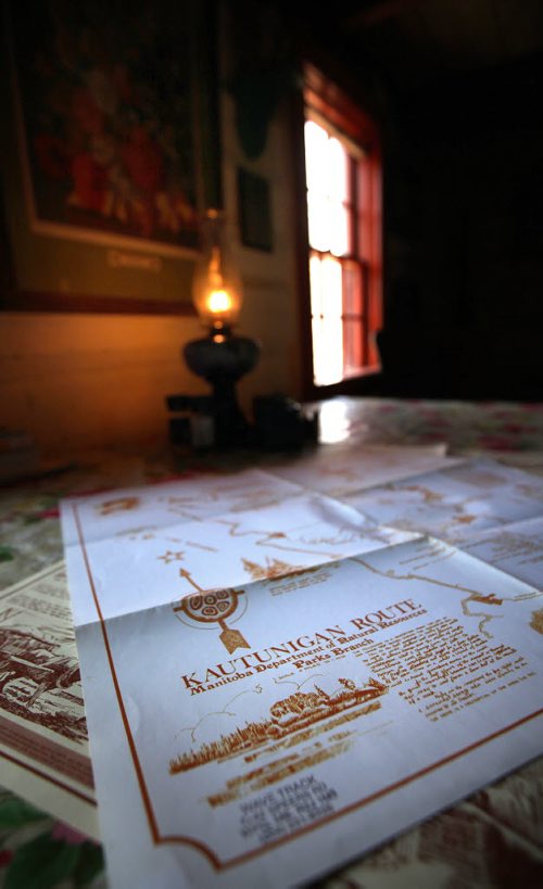A set of Real Berard's map routes sits on the table at his restored log cabin retreat near St Pierre. He's an artist, canoe route mapper, and political cartoonist. See Bill Redekop's story. April 29, 2015 - (Phil Hossack / Winnipeg Free Press)