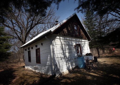 Real Berard's  restored log cabin near St Pierre See Bill Redekop's story. April 29, 2015 - (Phil Hossack / Winnipeg Free Press)