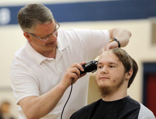 This week Shaftesbury is having a fundraising event in order to raise money for Cancer Care Manitoba. There will be different events all week, with the headline being Brave the Shave event today. Almost 20 participants are willing to shave their head in order to raise money, and show their support. There have been multiple staff members at our school that have fought cancer in the past three years. Students and staff have came together at Shaftesbury to fight with them in their battles. April is daffodil month for the cancer care foundation. Grade 10 student Ian Collett gets his lid shaved by social studies teacher Steve Peers. BORIS MINKEVICH/WINNIPEG FREE PRESS APRIL 30, 2015
