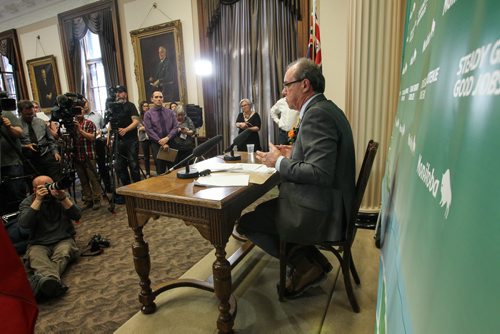 NDP Finance Minister Greg Dewar presents the 2015 Provincial Budget to the media prior to presenting to the provincial assembly Thursday afternoon. 150430 - Thursday, April 30, 2015 -  (MIKE DEAL / WINNIPEG FREE PRESS)