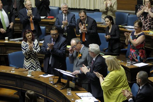 (centre staring at portable podium) Manitoba's new finance minister, Greg Dewar, presents his first budget in Winnipeg on Thursday afternoon. BORIS MINKEVICH/WINNIPEG FREE PRESS APRIL 30, 2015