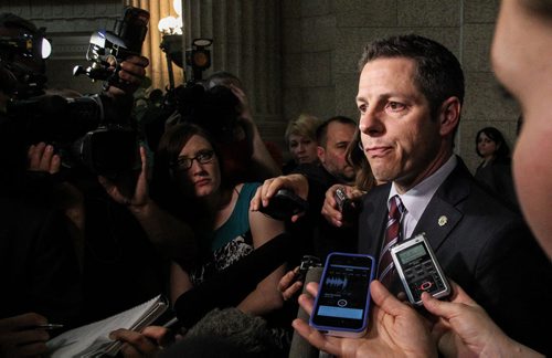 Winnipeg Mayor Brian Bowman addresses the media about the 2015 Provincial Budget after the Finance Minister's presentation to the provincial assembly Thursday afternoon. 150430 - Thursday, April 30, 2015 -  (MIKE DEAL / WINNIPEG FREE PRESS)