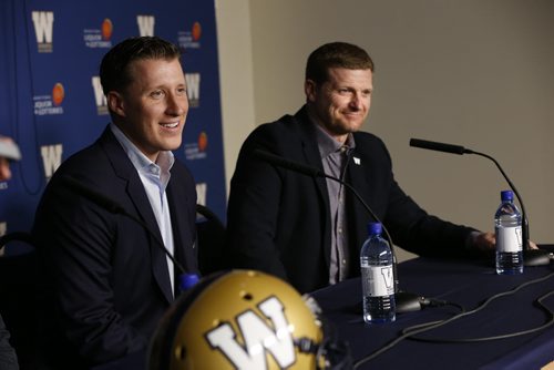 The Winnipeg Blue Bombers announced a contract extension for quarterback Drew Willy,left, at a news conference Friday morning, he is beside Coach Mike O'Shea. Wayne Glowacki/Winnipeg Free Press May 1 2015Tim Campbell / Gary Lawless stories Wayne Glowacki / Winnipeg Free Press May 1 2015