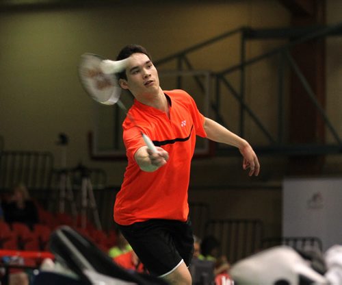Ty Lindeman (doubles teammate is Takeisha Wang, not in photo), of Alberta, returns the birdie back to his opponents in the doubles round against Jason Ho-Shue and Qungzi Quyang of Ontario, in the 2015 Yonex  National Badminton Championships at the U of W's Duckworth Centre Saturday.  May 02, 2015 Ruth Bonneville / Winnipeg Free Press