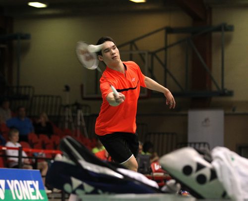 Ty Lindeman (doubles teammate is Takeisha Wang, not in photo), of Alberta, returns the birdie back to his opponents in the doubles round against Jason Ho-Shue and Qungzi Quyang of Ontario, in the 2015 Yonex  National Badminton Championships at the U of W's Duckworth Centre Saturday.  May 02, 2015 Ruth Bonneville / Winnipeg Free Press
