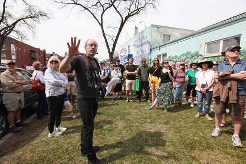 Dr. Jino Distasio, professor of Urban Studies at the U of W leads a group of about 70 people Saturday through the Riverview neighbourhood on a  90 minute historical walk titled Jane's Walk, which celebrates the legacy of urbanist Jane Jacobs.   See Alex Paul's story.  May 02, 2015 Ruth Bonneville / Winnipeg Free Press