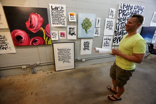 Artist Kal Barteski's pop up shop on Graham Avenue where she was selling paintings and custom script to fund her way to Germany for spinal surgery, Saturday, May 2, 2015. (TREVOR HAGAN/WINNIPEG FREE PRESS)