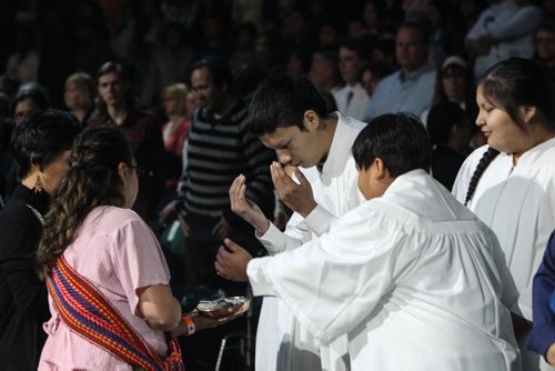 Thousands of Catholics gathered at the MTS Centre to take part in the Centennial Mass Sunday afternoon. The Ritual of Purification conducted by elders took place at the beginning of the event. 150503 - Sunday, May 03, 2015 -  (MIKE DEAL / WINNIPEG FREE PRESS)