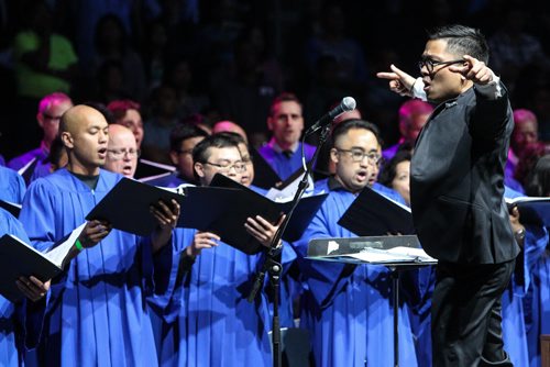 Thousands of Catholics gathered at the MTS Centre to take part in the Centennial Mass Sunday afternoon. Father Geoffrey Angeles conducts the Archdiocesan Choir. 150503 - Sunday, May 03, 2015 -  (MIKE DEAL / WINNIPEG FREE PRESS)