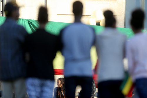 Members of the Ethiopian community gathered at the Manitoba Legislative Building to hold a vigil and ceremony mourning Ethiopians who have been killed and persecuted in recent weeks in African countries and around the world, Sunday, May 3, 2015. (TREVOR HAGAN/WINNIPEG FREE PRESS)