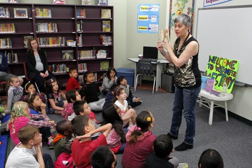 ENT - Actress and writer Meg Tilly reads to King Edward School students in the school's library. Randall King story. BORIS MINKEVICH/WINNIPEG FREE PRESS May 4, 2015