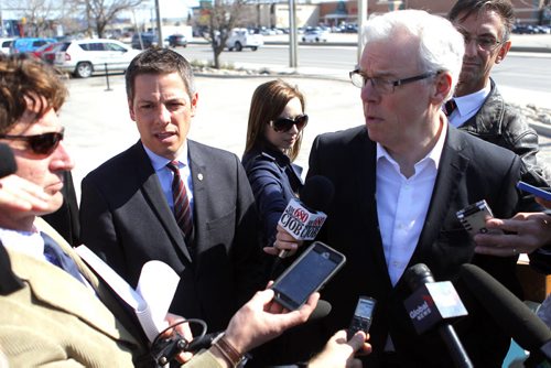 LOCAL - left Mayor Brian Bowman and right Premier Greg Selinger. Press conference at Boston Pizza parking lot, corner of Ness Avenue and St. James Street TOPIC: Province's annual funding to the City of Winnipeg to improve city streets and create jobs. BORIS MINKEVICH/WINNIPEG FREE PRESS May 4, 2015