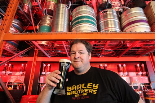 Barley Brothers president and co-founder Noel Bernier. Beer is still the king of booze in Manitoba. It is also the fastest growing category of booze in terms of sales growth, in large part because of the runaway popularity of craft beers. This location of Barley Brothers on Pembina Hwy. has 156 different types of craft beer on tap in a two-story-high cooler. 150504 - Monday, May 04, 2015 -  (MIKE DEAL / WINNIPEG FREE PRESS)