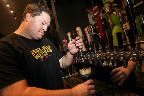 Barley Brothers president and co-founder Noel Bernier. Beer is still the king of booze in Manitoba. It is also the fastest growing category of booze in terms of sales growth, in large part because of the runaway popularity of craft beers. This location of Barley Brothers on Pembina Hwy. has 156 different types of craft beer on tap in a two-story-high cooler. 150504 - Monday, May 04, 2015 -  (MIKE DEAL / WINNIPEG FREE PRESS)