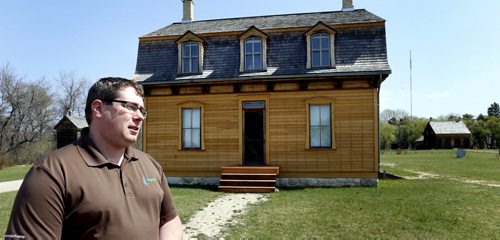 Sloan Cathcart, Head of Interpretation with the Manitoba Conservation and Water Stewardship at the St. Norbert Heritage Provincial Park. He is by the Bohémier House in the park.  Bill Redekop story Wayne Glowacki / Winnipeg Free Press May 5 2015