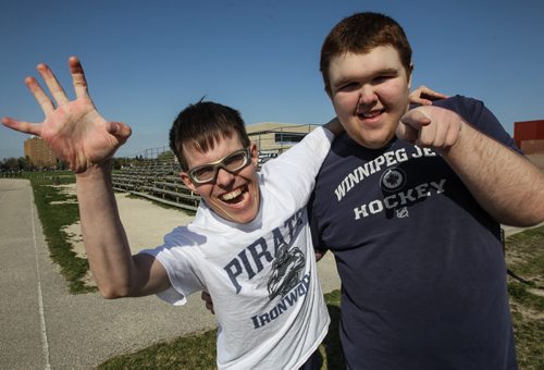 Ben Gunnarsson, 21(left), and Jack Funk, 17 (right) who are both in teacher Bobbi Milberg's special education physical education class training on the field beside Grant Park Collegiate. Some of the intellectually challenged students will be taking part in this years provincial track and field championships. 150505 - Tuesday, May 05, 2015 -  (MIKE DEAL / WINNIPEG FREE PRESS)