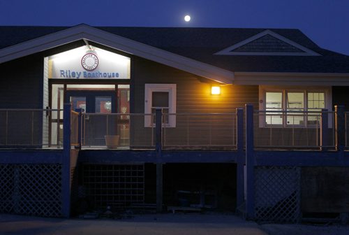 49.8 BORDERS - The Winnipeg Rowing Club begins it's day before the sun comes up. The moon rises over the club. BORIS MINKEVICH/WINNIPEG FREE PRESS May 5, 2015