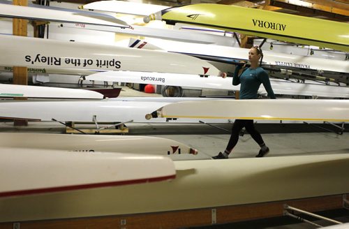 49.8 BORDERS - The Winnipeg Rowing Club. Amy Kroeker helps get the oars out. BORIS MINKEVICH/WINNIPEG FREE PRESS May 5, 2015