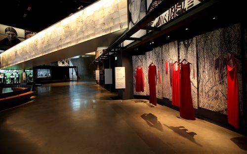 "The Red Dress display speaks to murdered and missing aborigional women, "CMHR and displays about aborigional atrocities to illustrate - CMHR WHISTLEBLOWER: A former curator at the Canadian Museum for Human Rights says she was ordered to limit negative stories about missing and murdered indigenous women and the state of aboriginal child welfare and remove the term genocide from any indigenous exhibits. In a sharply worded chapter in a new academic book, Tricia Logan, who served as the CMHRs curator of indigenous content for three years, says the museum is a model of complacency and promotion of the status quo. This is not the first time shes written such things. Last year, she wrote a chapter for a book to be published by the U of M. When the museum got wind of it, she was forced to withdraw the chapter. 15 inches. Box of pull quotes. CAN ALSO POST ONLINE EARLY, WITH A PDF OF HER ¤ARTICLE.  See Mary Agnes story. May 6, 2015 - (Phil Hossack / Winnipeg Free Press)