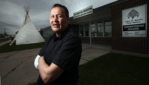 Lake St Martin Chief Adrian Sinclair poses in front of the displaced band's Winnipeg Headquarters Wednesday afternoon. See Alex Paul's story. May 6, 2015 - (Phil Hossack / Winnipeg Free Press)