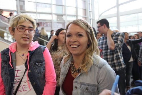 Shannon Stevenson (right) and her friend Amanda Walsh are all smiles as they make their way into the MTS Centre to see Luke Bryan Wednesday night.   Wednesday, May 06/15 Ruth Bonneville  / Winnipeg Free Press