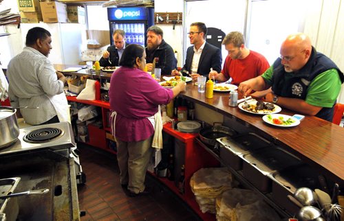 Famena's Famous Roti - 295 Garry Street. Sanderson story. (L-R behind counter) Mohammed and Famena Ally own the restaurant. BORIS MINKEVICH/WINNIPEG FREE PRESS May 7, 2015