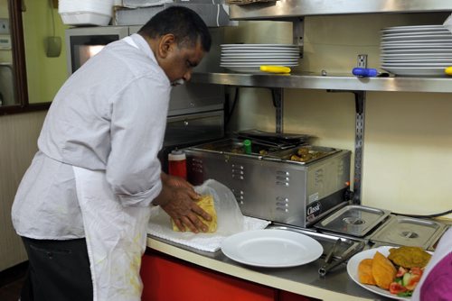 Famena's Famous Roti - 295 Garry Street. Sanderson story. Mohammed Ally maker a roti. BORIS MINKEVICH/WINNIPEG FREE PRESS May 7, 2015