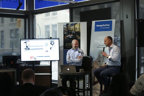 At the Winnipeg Free Press News Cafe Friday,  Christian Panson, V.P Digital Content and Audience Revenue with Paul Samyn, Winnipeg Free Press Editor  at right give a sneak preview of  the paper's  new website. Wayne Glowacki / Winnipeg Free Press May 8 2015