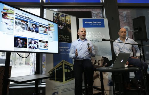 At the Winnipeg Free Press News Cafe Friday,  Christian Panson, V.P Digital Content and Audience Revenue at left with Paul Samyn, Winnipeg Free Press Editor give a sneak preview of  the paper's  new website. Wayne Glowacki / Winnipeg Free Press May 8 2015