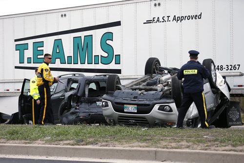 May 10, 2015 - 150510  -  Emergency personnel were called to a five vehicle collision on the Perimeter just east of St. Anne's Saturday, May 10, 2015. Several people were taken to hospital with non-life threatening injuries. West bound lanes were closed for several hours. John Woods / Winnipeg Free Press