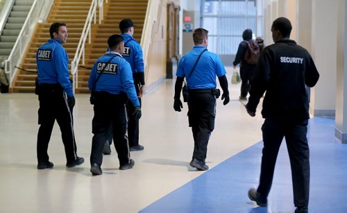 Police Cadet working with MTS Centre security to remove intoxicated persons from the premises, for Katie May story, Friday, May 8, 2015. (TREVOR HAGAN/WINNIPEG FREE PRESS)