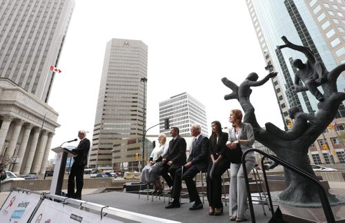 At the United Way of Winnipeg's 50th anniversary celebration event Monday at Portage and Main on stage from left is Herb Peters, Chair, United Way of Winnipeg Board of Trustees at podium, Minister Kerri Irvin-Ross, Mayor Brian Bowman, Hartley Richardson, President & CEO, James Richardson & Sons, whose father George Richardson was a United Way of Winnipeg founder, Victoria Truong, Chair, Youth United Council, representing the future leaders of United Way and Ayn Wilcox, Chair, United Way of Winnipeg 50th Anniversary Committee. Geoff Kirbyson story. Wayne Glowacki / Winnipeg Free Press May 11  2015